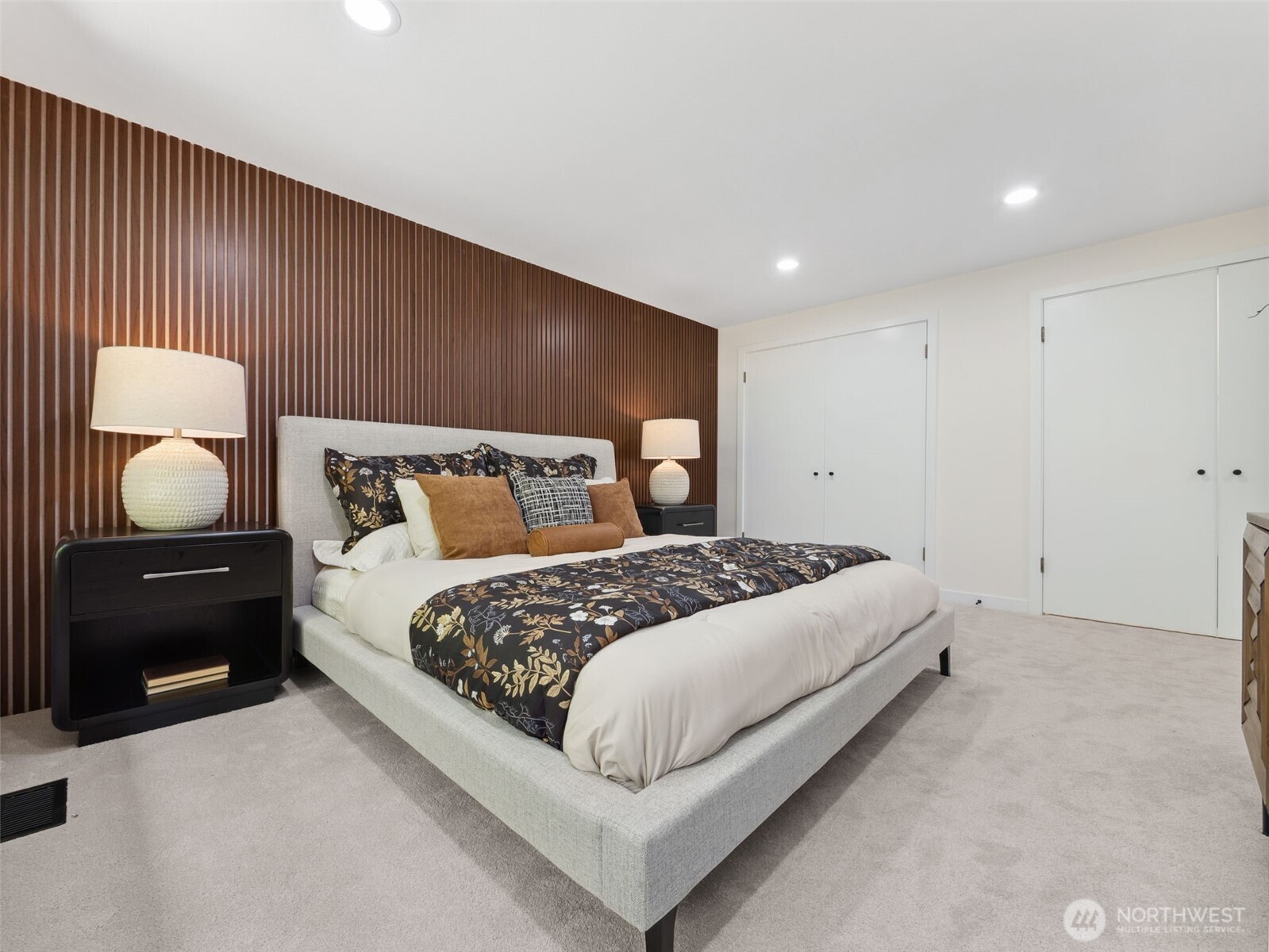 6423 East Mercer Way Mercer Island, WA 98040 - Photo 18 of 39 a bedroom with a bed and window