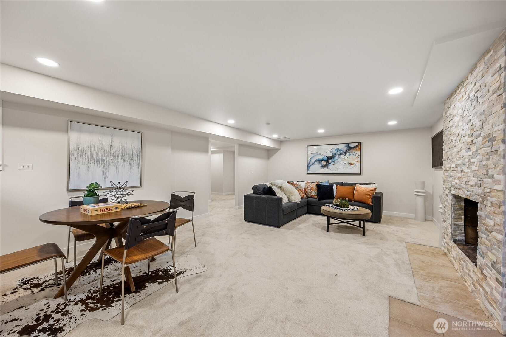 6423 East Mercer Way Mercer Island, WA 98040 - Photo 25 of 39 a living room with furniture and a fireplace