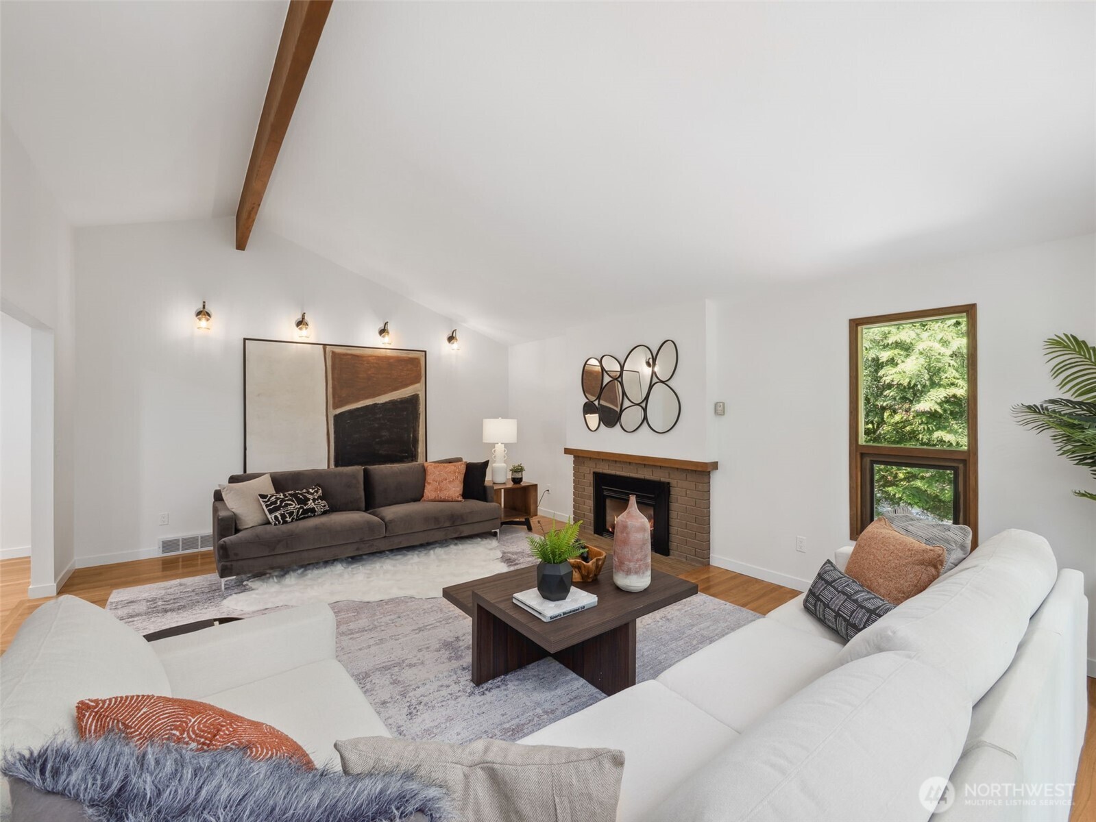 6423 East Mercer Way Mercer Island, WA 98040 - Photo 6 of 39 a living room with furniture and a fireplace