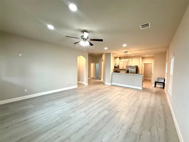 a view of an empty room and window