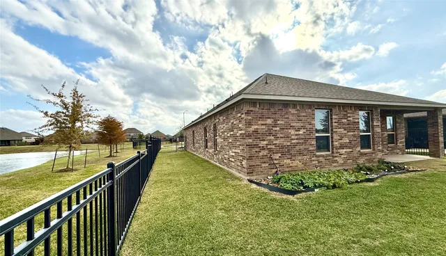 a view of a house with a garden