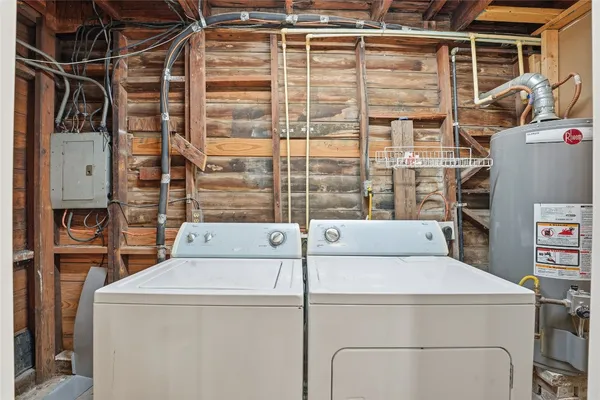 a utility room with dryer and washer