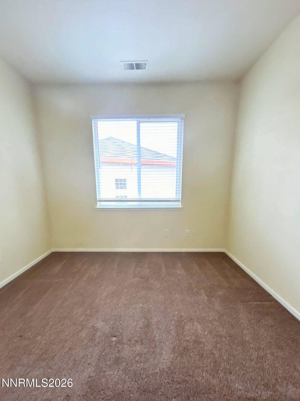 9535 Comanche Moon Drive Reno, NV 89521 - Photo 15 of 20 an empty room with a window