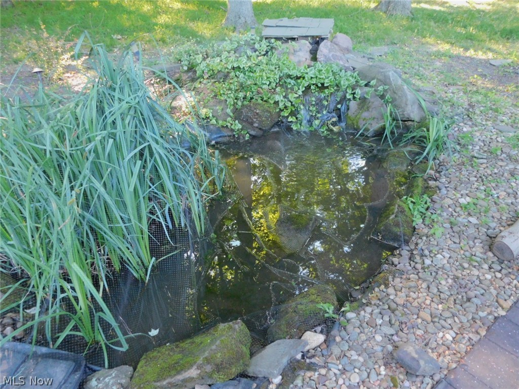 13014 Falling Water Road Strongsville, OH 44136 - Photo 16 of 31 Koi Pond in backyard.