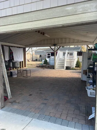 a view of parking garage with cars