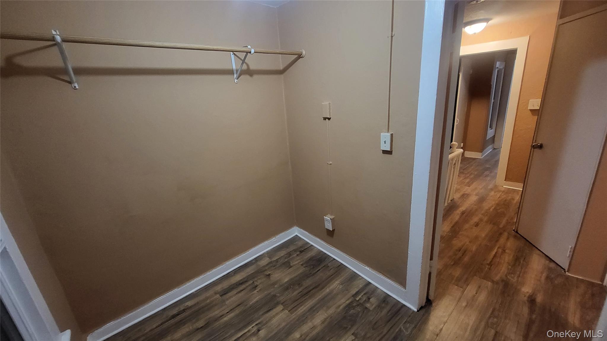 92 Academy Street Poughkeepsie, NY 12601 - Photo 18 of 28 a view of a room with wooden floor