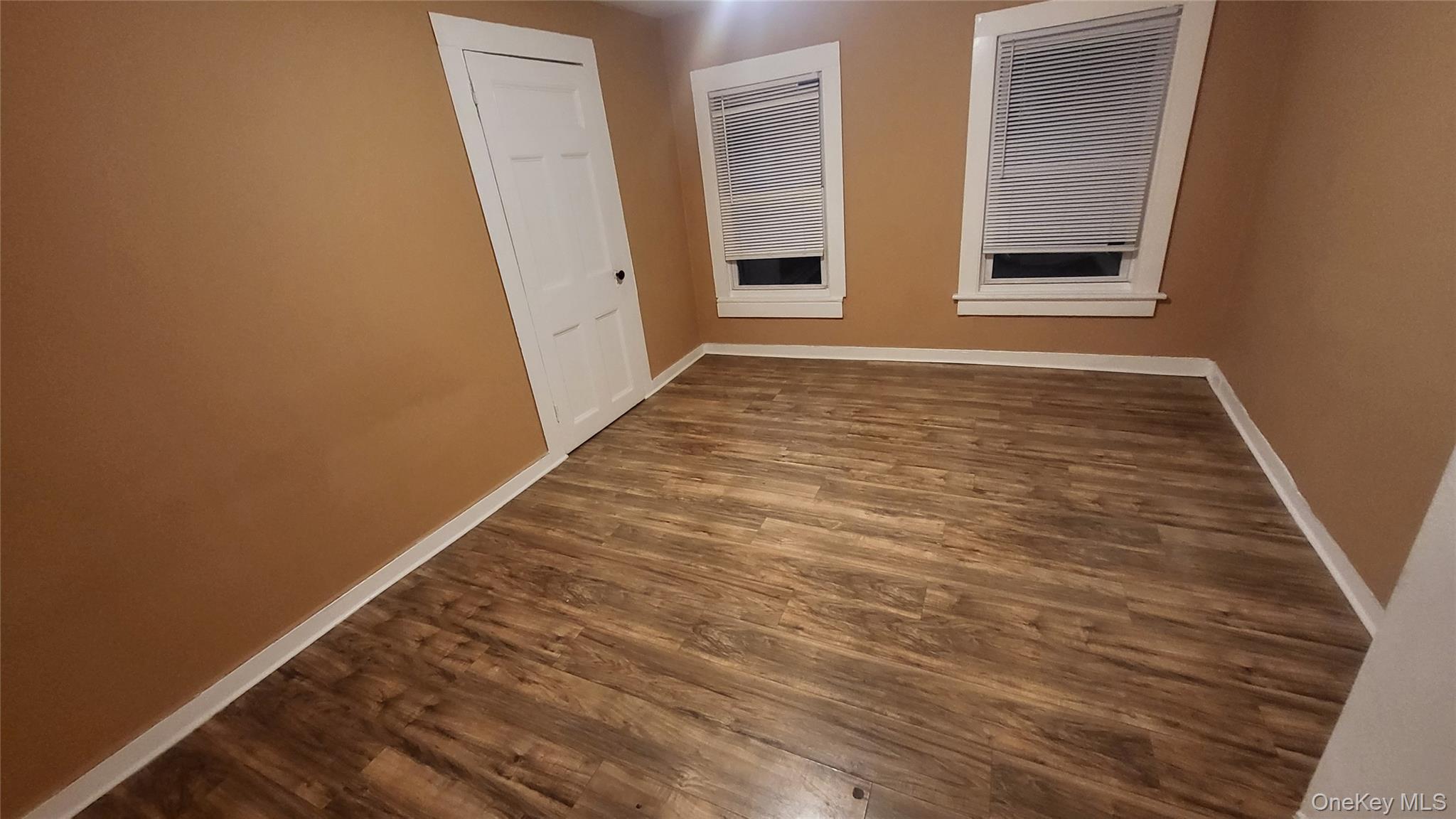 92 Academy Street Poughkeepsie, NY 12601 - Photo 24 of 28 a view of an empty room with windows