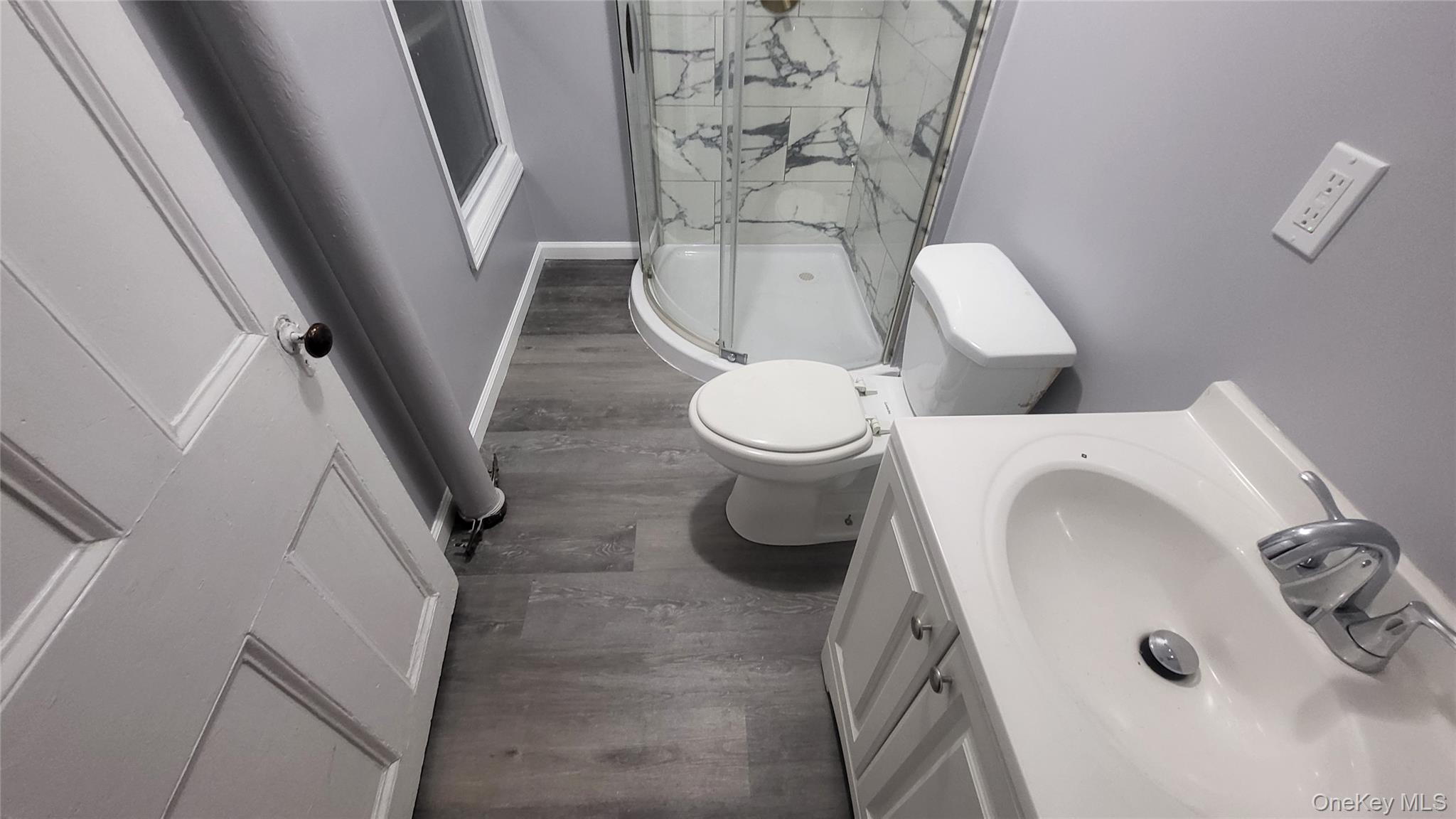 92 Academy Street Poughkeepsie, NY 12601 - Photo 26 of 28 a bathroom with a toilet and a shower