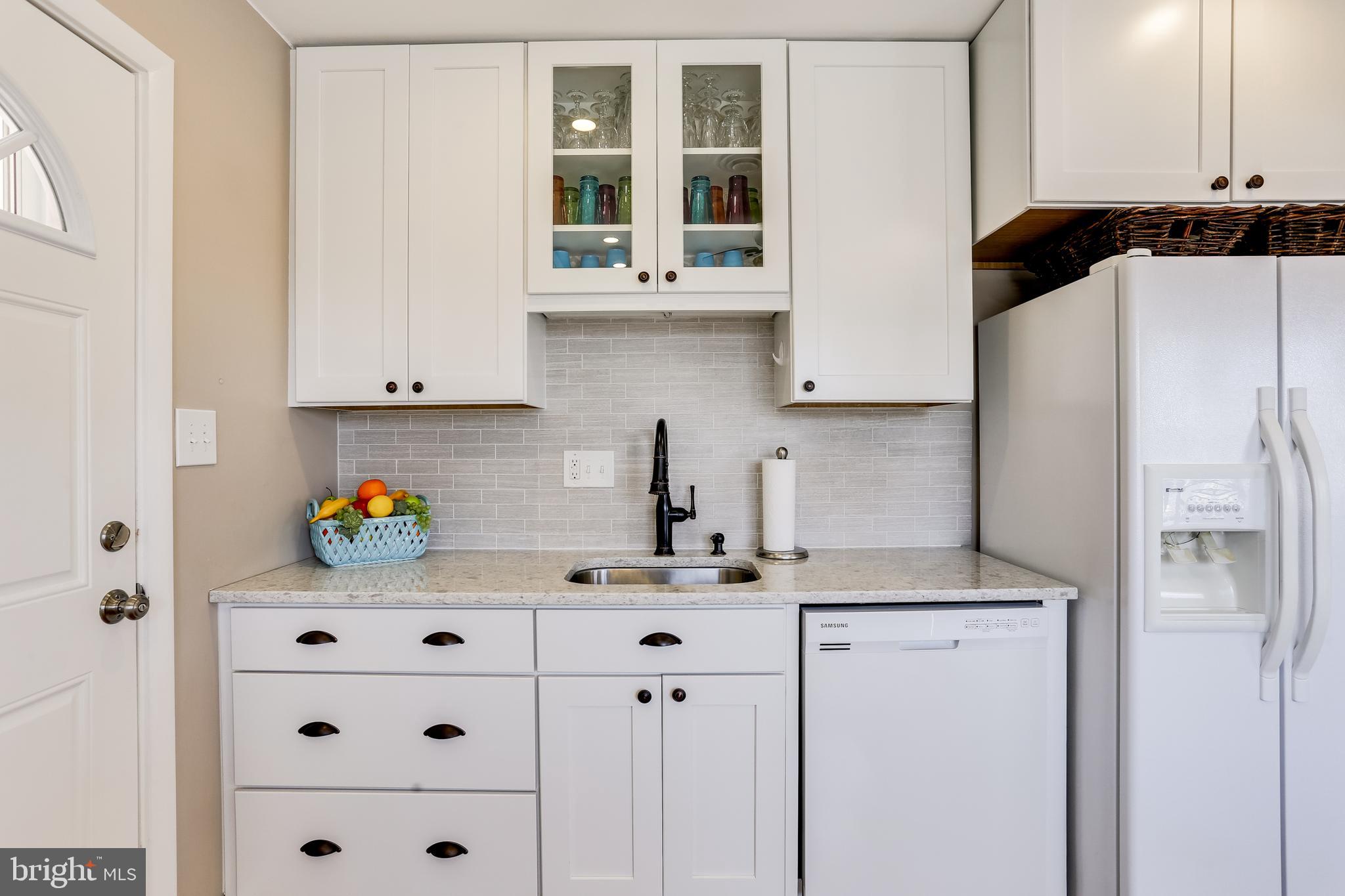 6003 Burnt Oak Road Catonsville, MD 21228 - Photo 10 of 28 Accent glass fronted cabinets above sink!