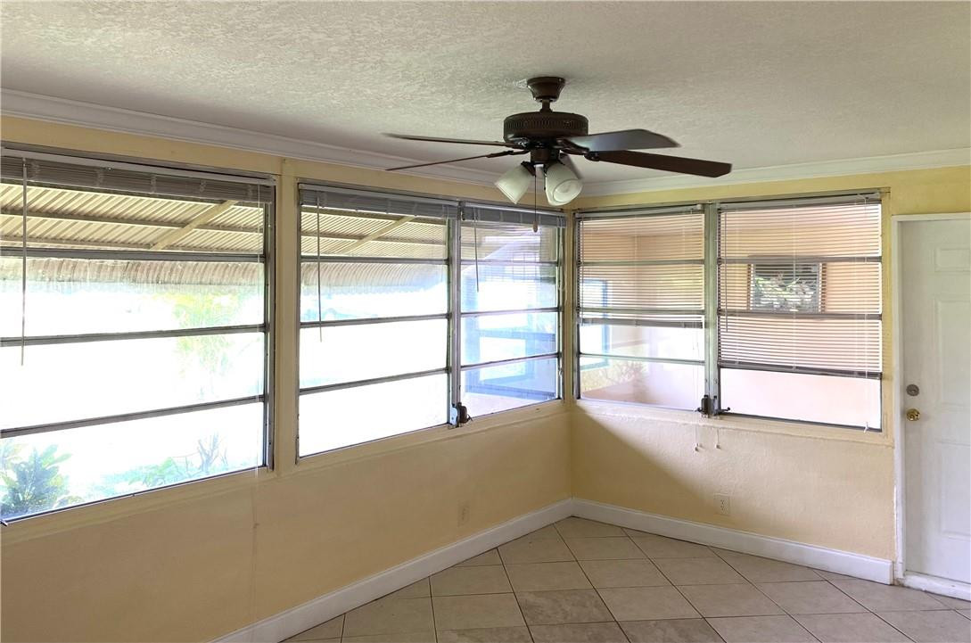 5019 Northwest 49th Road Tamarac, FL 33319 - Photo 13 of 25 a view of a room with a large window