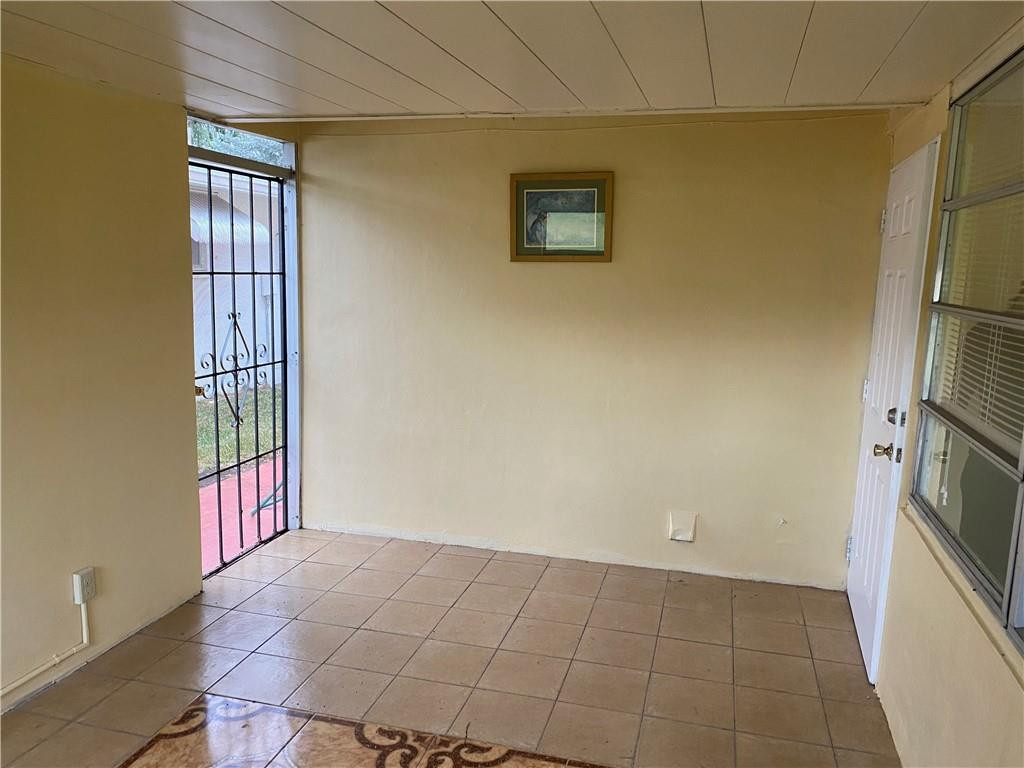 5019 Northwest 49th Road Tamarac, FL 33319 - Photo 14 of 25 a view of an empty room with a fireplace