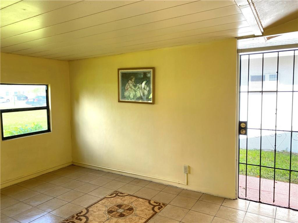 5019 Northwest 49th Road Tamarac, FL 33319 - Photo 15 of 25 a view of a room with a window