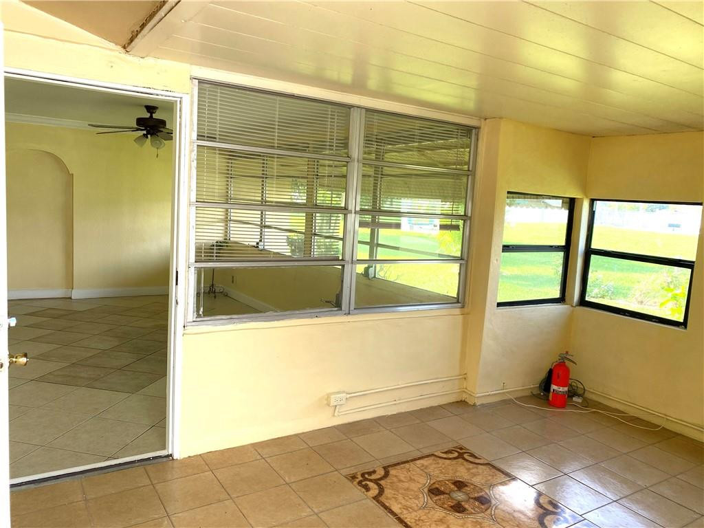 5019 Northwest 49th Road Tamarac, FL 33319 - Photo 16 of 25 a view of a bathroom with a tub