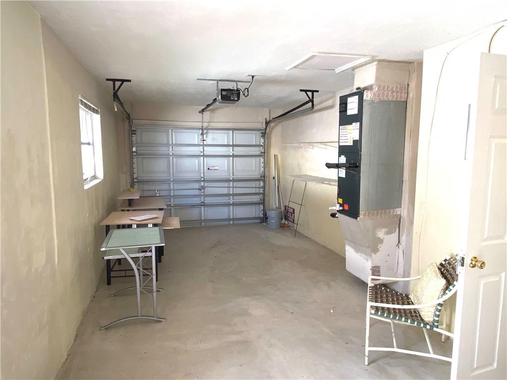5019 Northwest 49th Road Tamarac, FL 33319 - Photo 17 of 25 a room with furniture and white walls