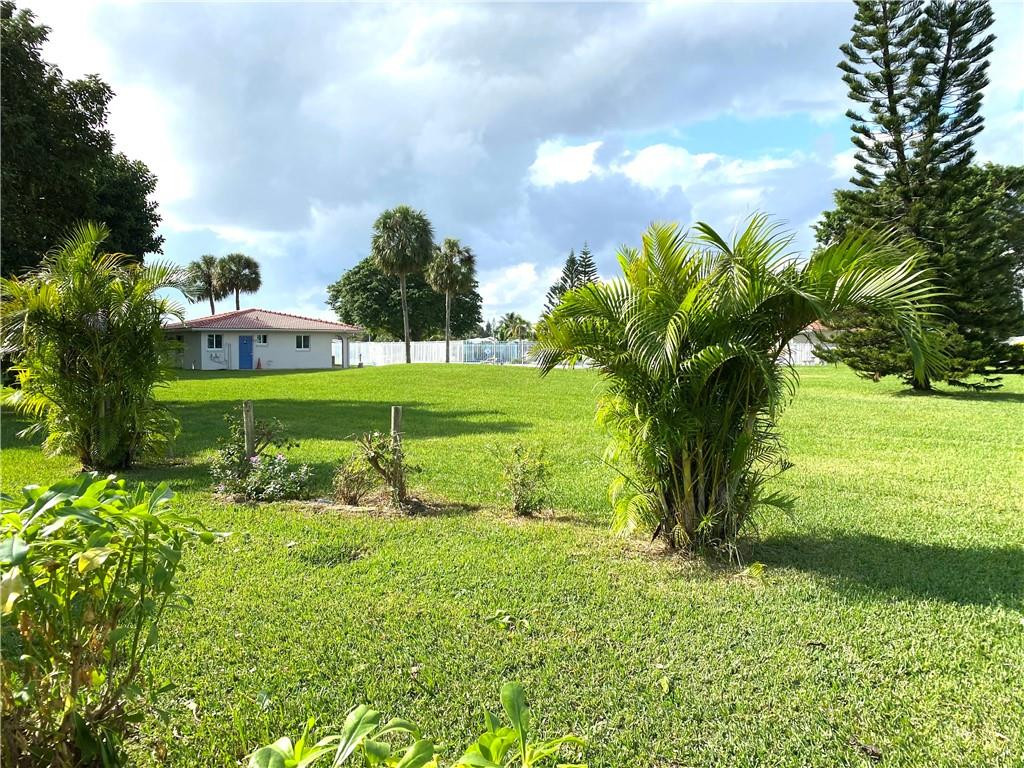 5019 Northwest 49th Road Tamarac, FL 33319 - Photo 3 of 25 a view of a park with large trees