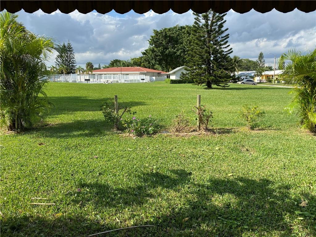 5019 Northwest 49th Road Tamarac, FL 33319 - Photo 4 of 25 a view of a golf course with a lake