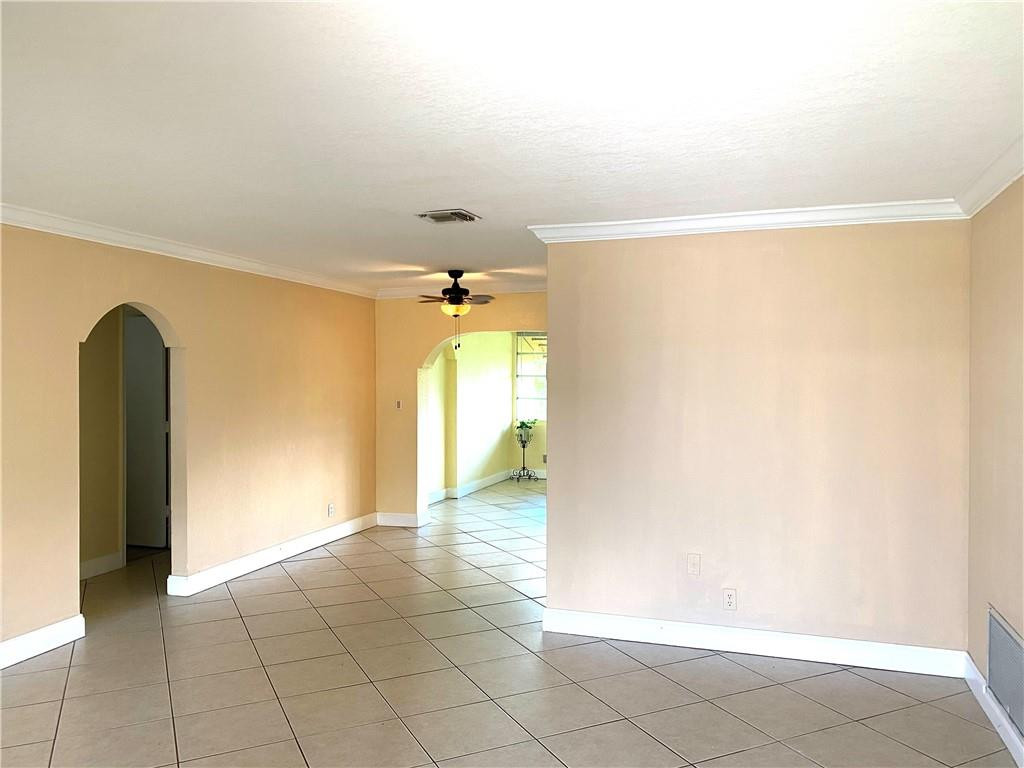 5019 Northwest 49th Road Tamarac, FL 33319 - Photo 9 of 25 a view of a room with window