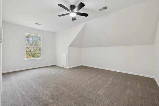 a view of balcony with wooden floor