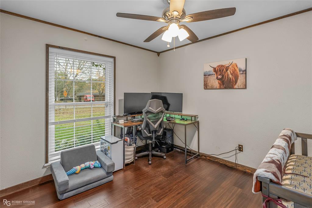 3237 Pinehaven Lane Haughton, LA 71037 - Photo 11 of 16 a view of workspace with wooden floor windows and piano