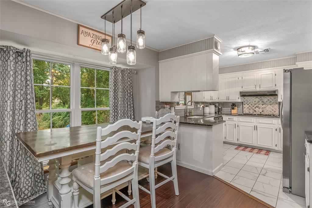 3237 Pinehaven Lane Haughton, LA 71037 - Photo 4 of 16 a view of a dining room with furniture window and outside view