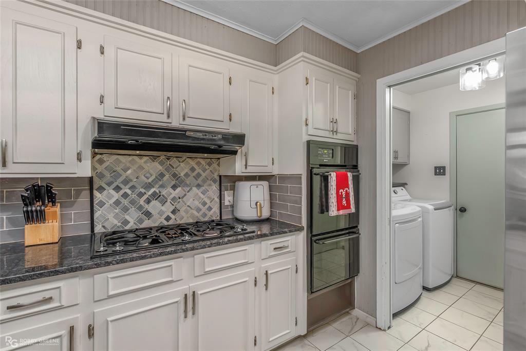 3237 Pinehaven Lane Haughton, LA 71037 - Photo 6 of 16 a kitchen with stainless steel appliances granite countertop a refrigerator and a stove
