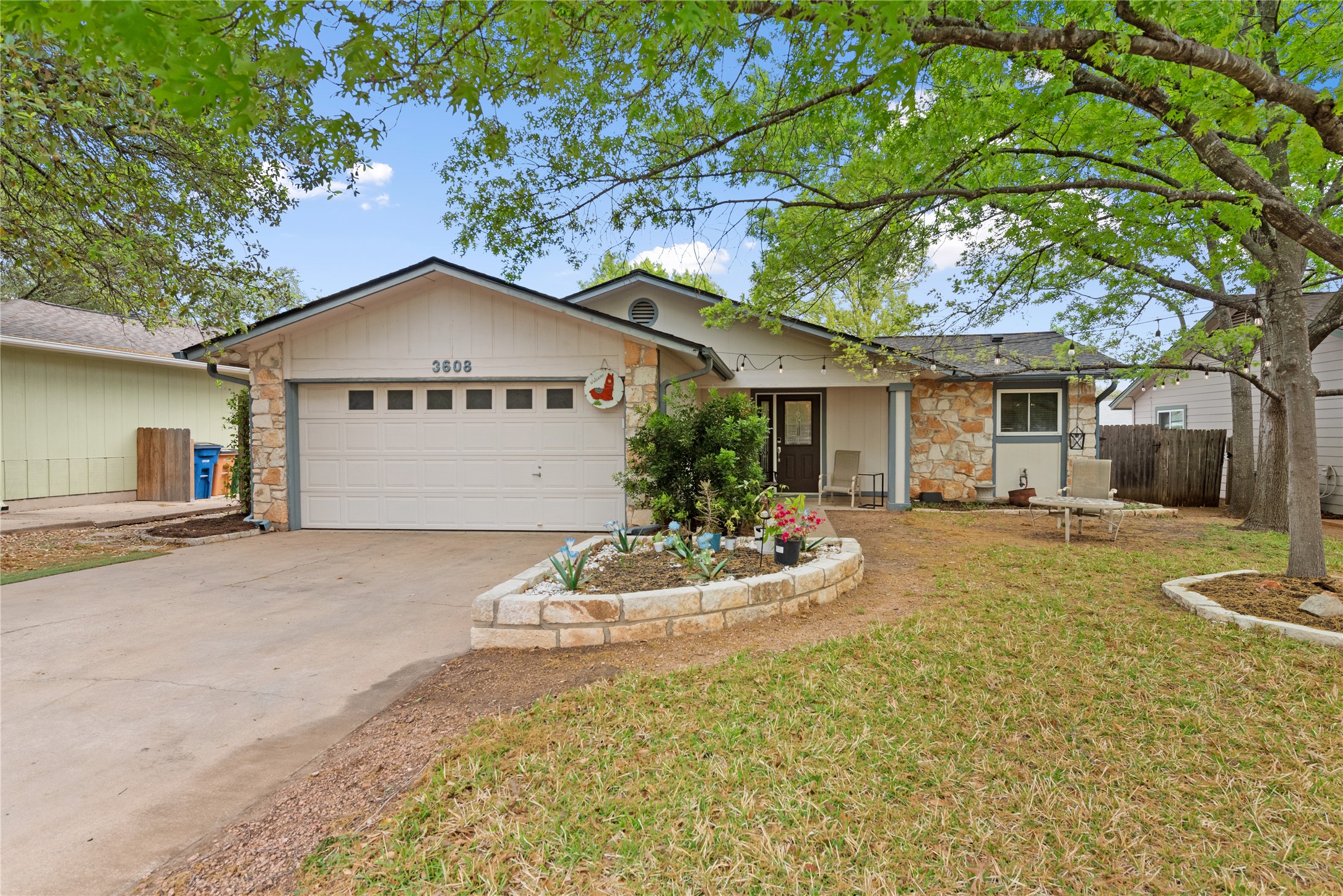 3608 Cookstown Drive Austin, TX 78759 - Photo 1 of 22 a front view of a house with a yard and garage