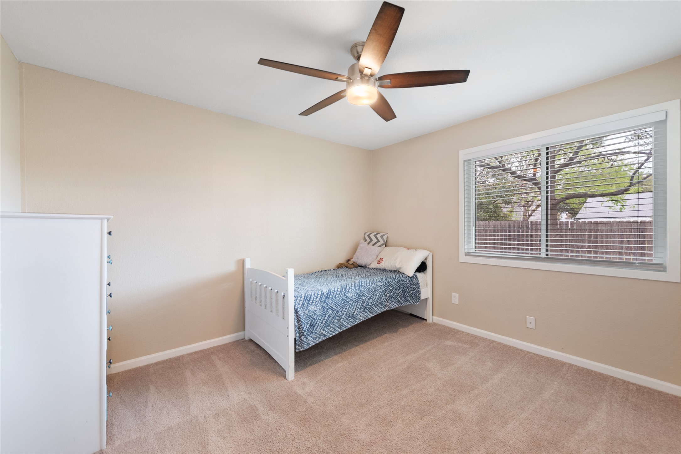3608 Cookstown Drive Austin, TX 78759 - Photo 12 of 22 a bedroom with a bed and a ceiling fan