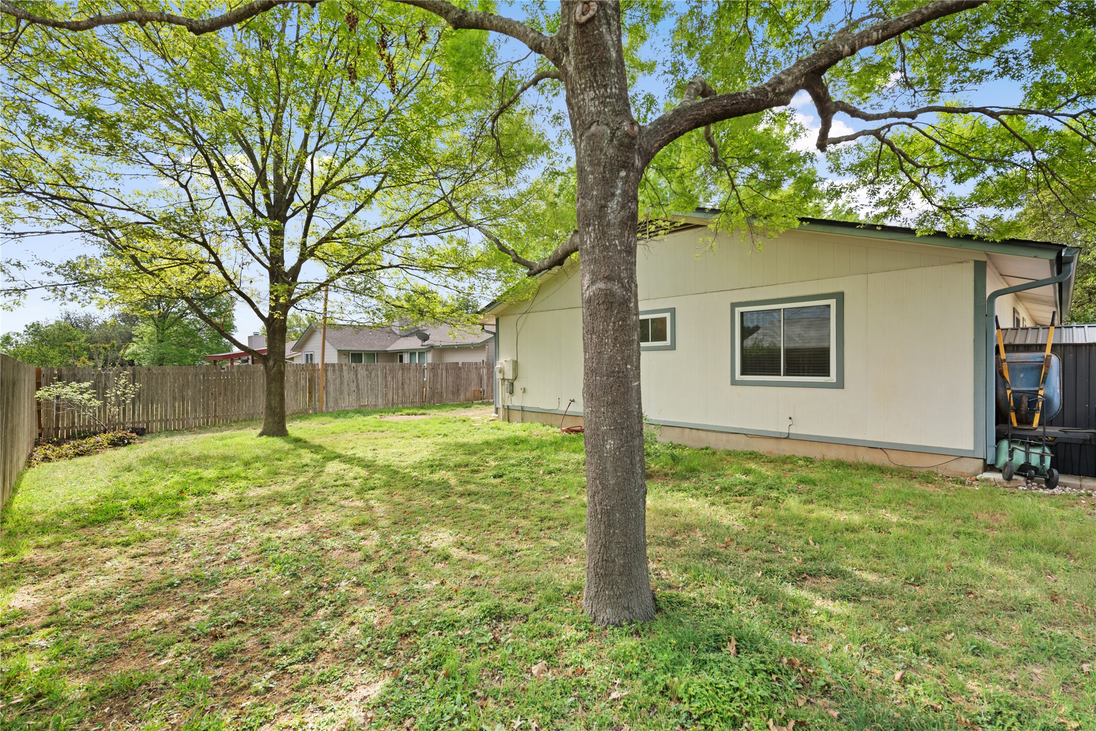 3608 Cookstown Drive Austin, TX 78759 - Photo 21 of 22 a house with a tree in the grass