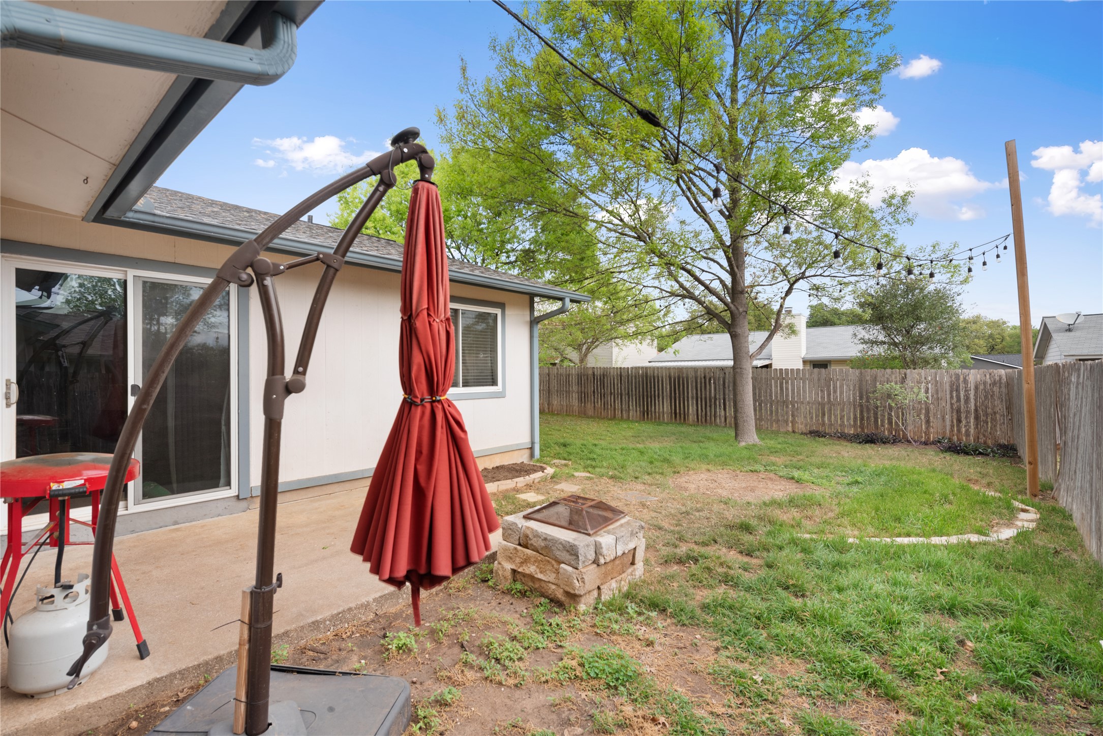 3608 Cookstown Drive Austin, TX 78759 - Photo 22 of 22 a view of backyard with slide and a slide