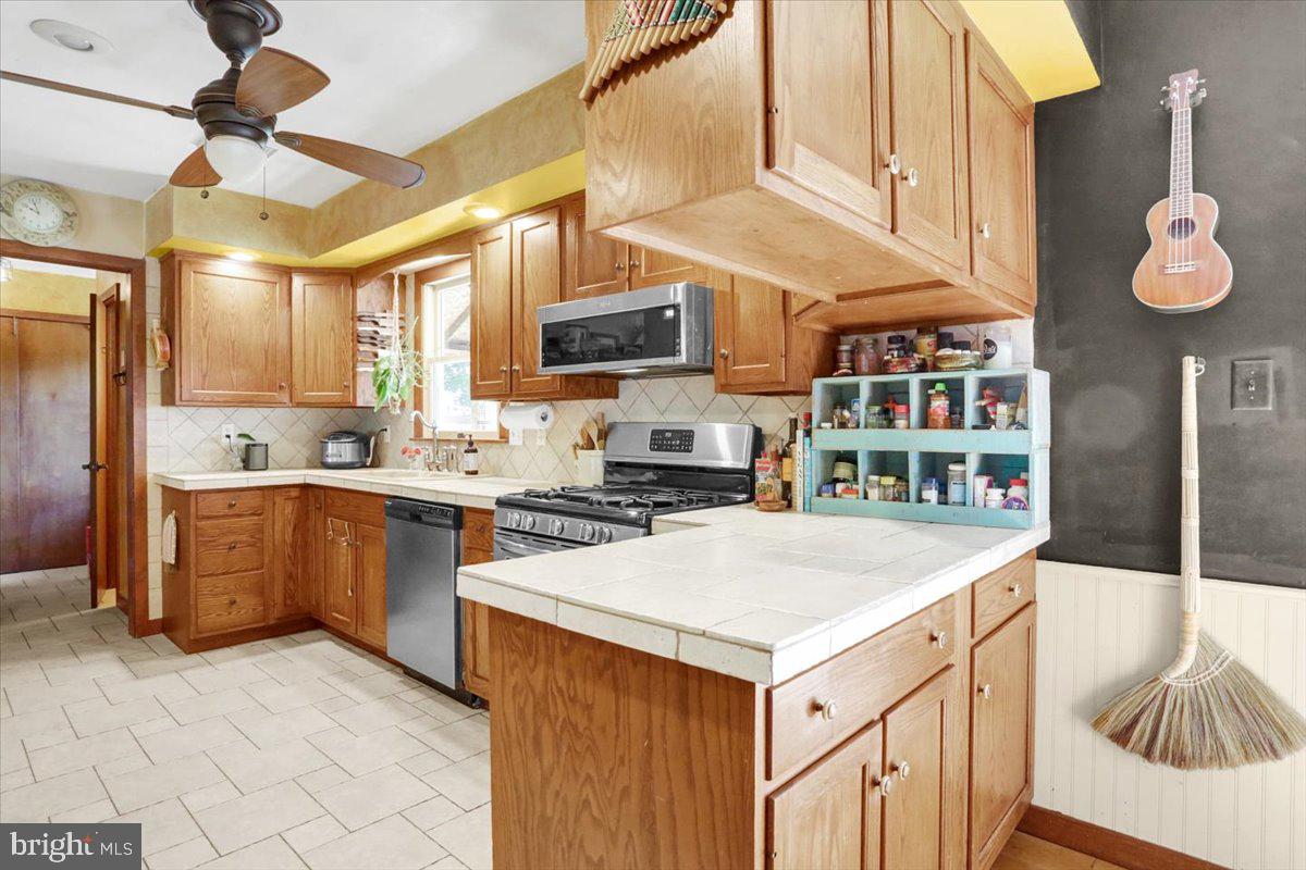 799 Gibraltar Road Reading, PA 19606 - Photo 10 of 35 Durable Italian porcelain and floors.