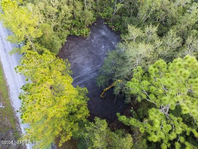 a view of a garden with a yard