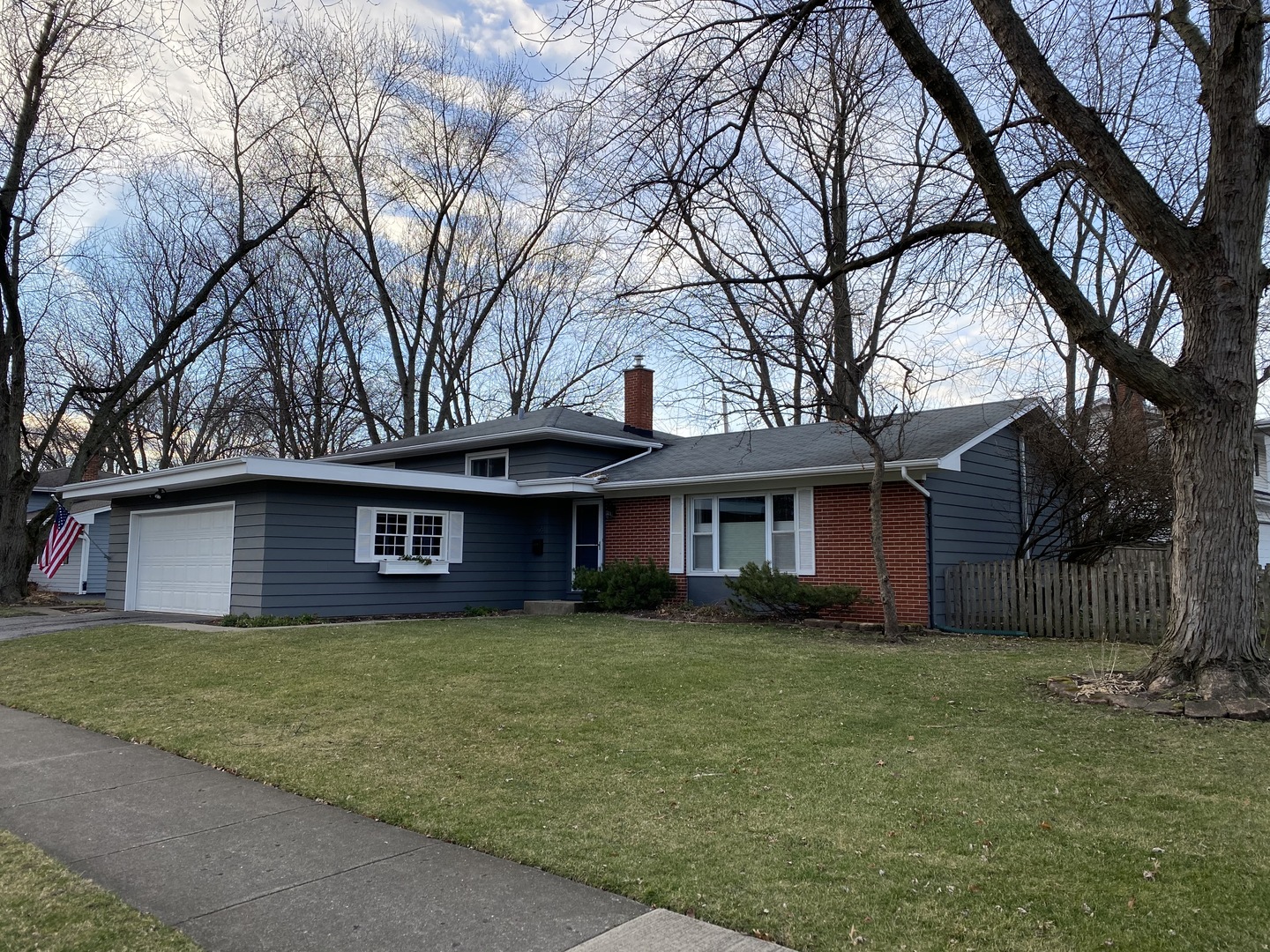 305 West Gartner Road Naperville, IL 60540 - Photo 2 of 20 a house that has a tree in front of it