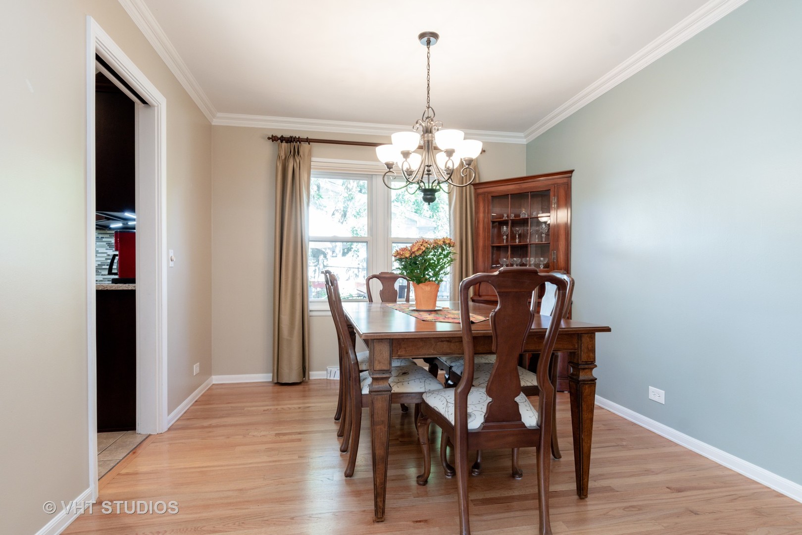 305 West Gartner Road Naperville, IL 60540 - Photo 5 of 20 a view of a dining room with furniture window and wooden floor