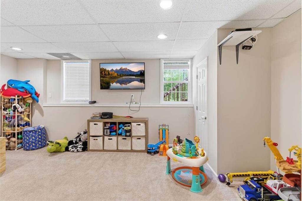 101 Brookcliff Court Temple, GA 30179 - Photo 12 of 48 a room with toys and a couch