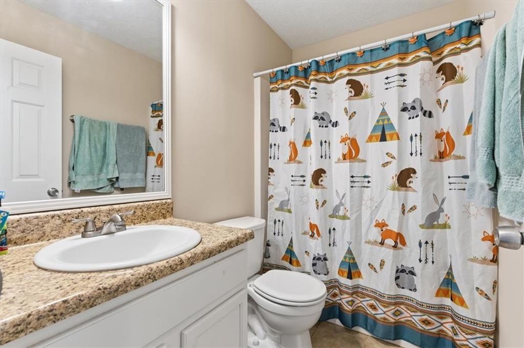 101 Brookcliff Court Temple, GA 30179 - Photo 15 of 48 a bathroom with a sink and a mirror