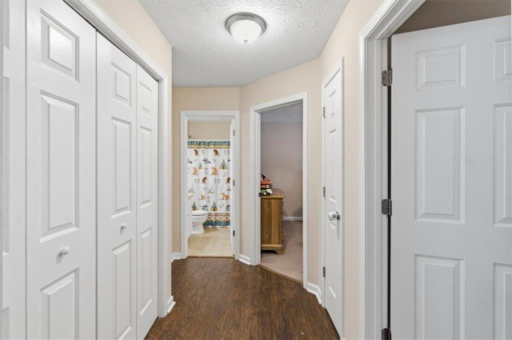 101 Brookcliff Court Temple, GA 30179 - Photo 18 of 48 wooden floor with windows and closet in a room