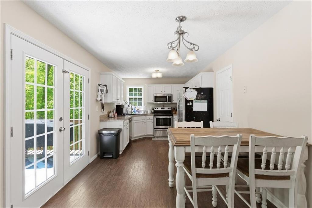 101 Brookcliff Court Temple, GA 30179 - Photo 27 of 48 a view of a dining room with furniture window and wooden floor