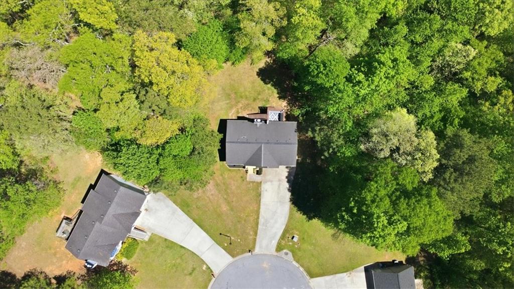 101 Brookcliff Court Temple, GA 30179 - Photo 42 of 48 an aerial view of a house with a yard and swimming pool