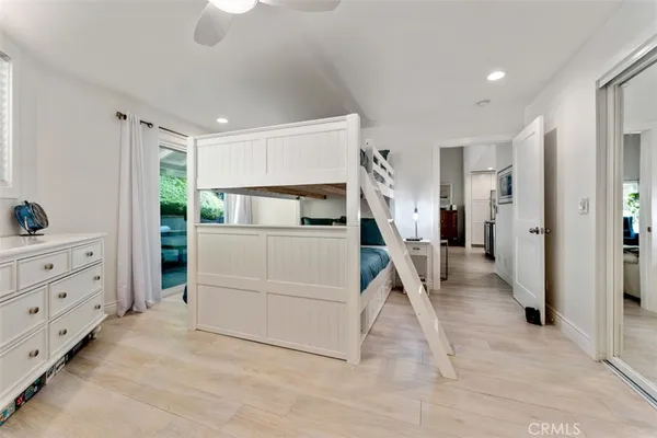 a bathroom with a toilet and a bathtub