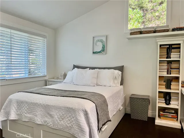 a view of a backyard with table and chairs