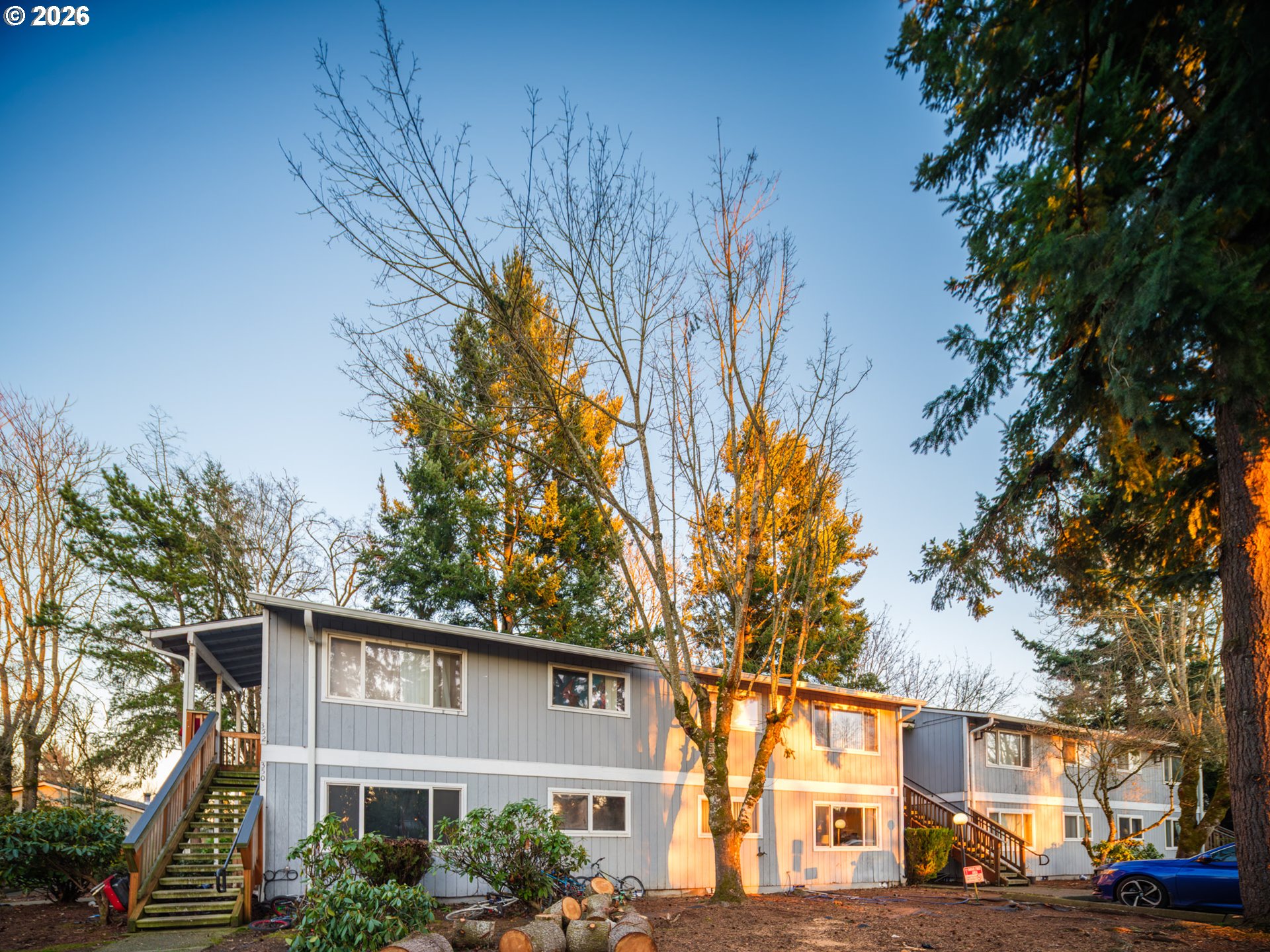 340 South Locust Street Canby, OR 97013 - Photo 17 of 21 a view of a street with a house in the background