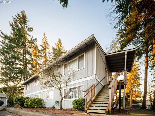 a view of a street with houses