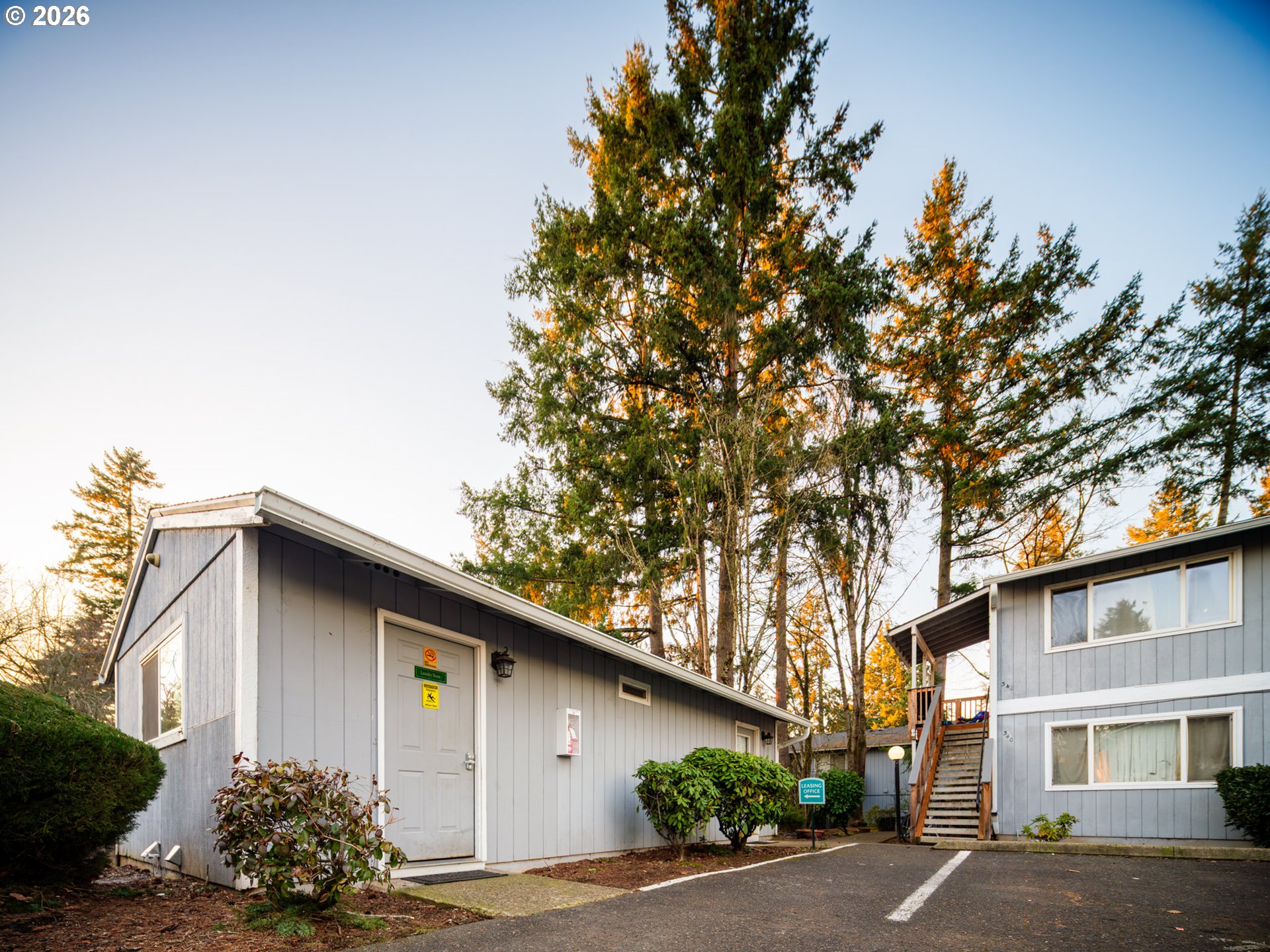 340 South Locust Street Canby, OR 97013 - Photo 2 of 21 a house with a tree in front of it