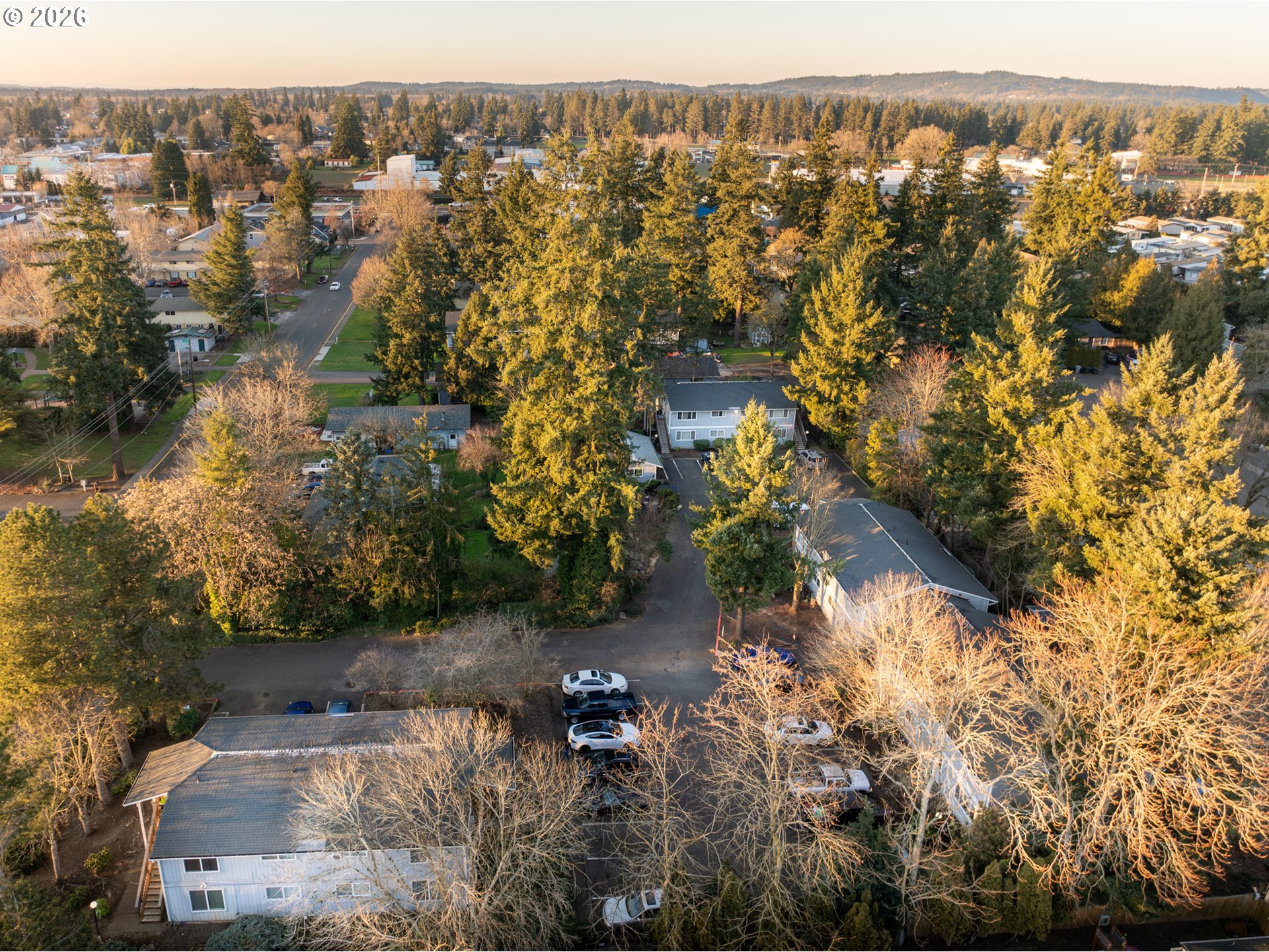 340 South Locust Street Canby, OR 97013 - Photo 5 of 21 an aerial view of a house with a yard