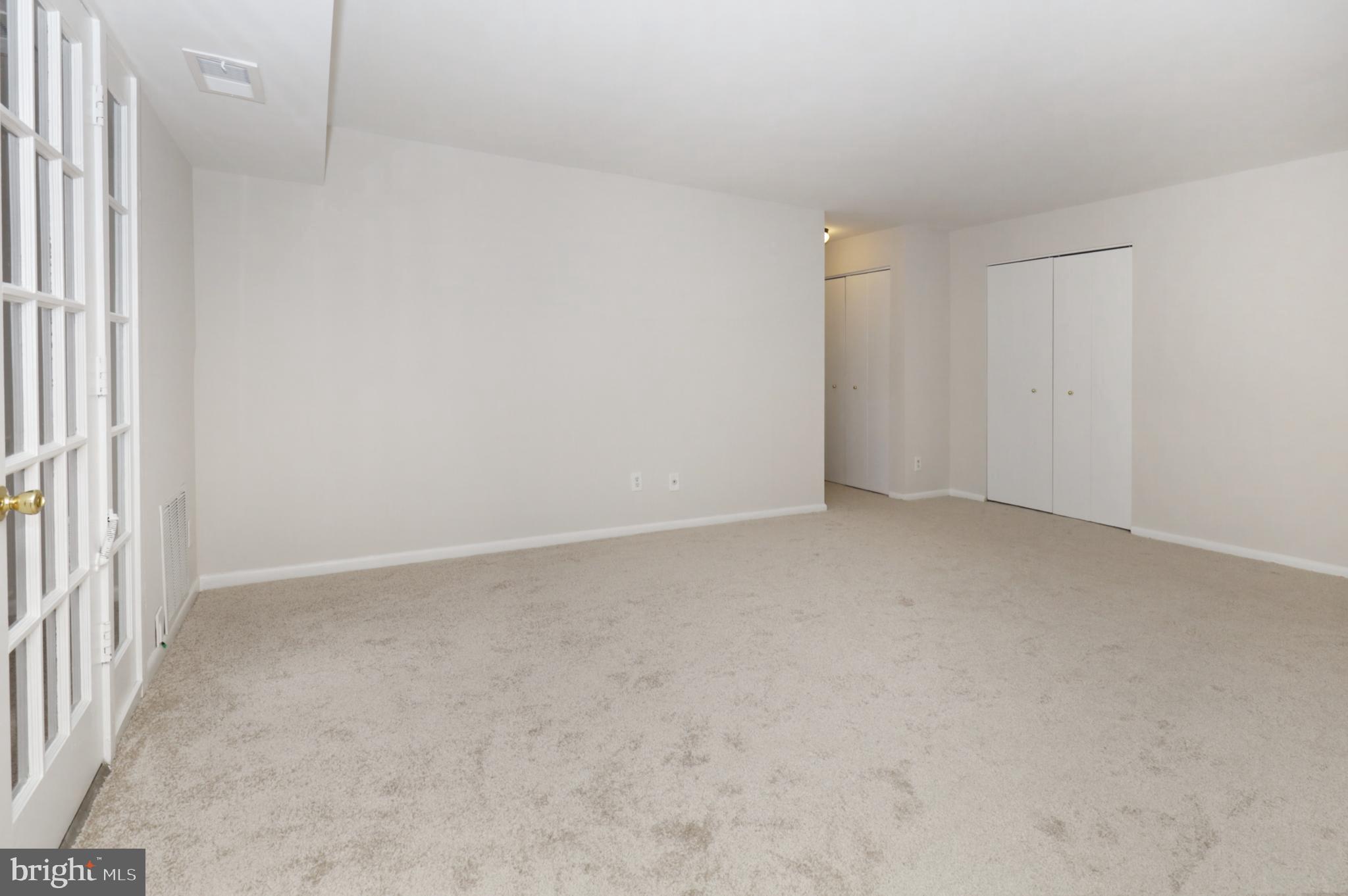 7093 Spring Garden Drive, Unit 101 Springfield, VA 22150 - Photo 8 of 23 a view of an empty room