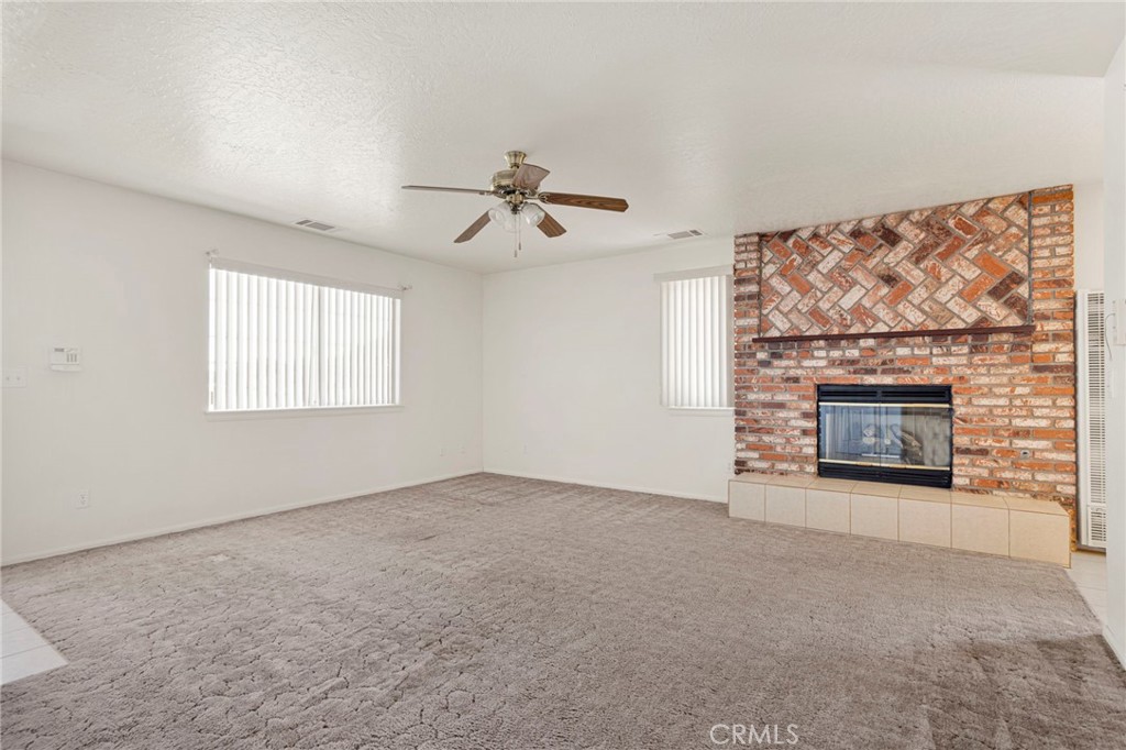 11281 4th Hesperia, CA 92345 - Photo 8 of 35 Cozy fireplace with hearth