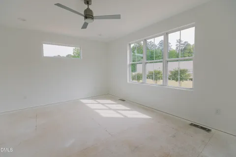 an empty room with windows