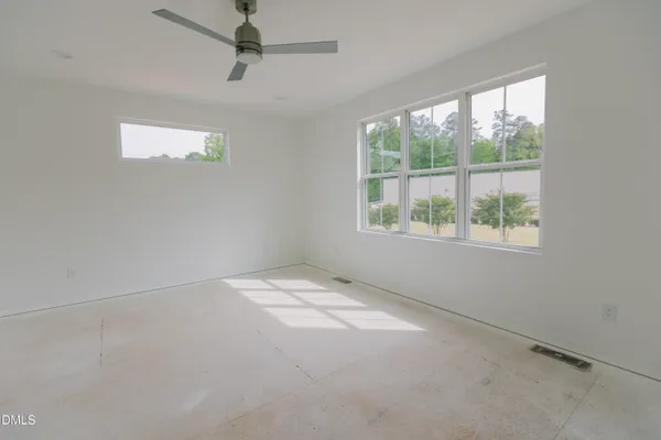 an empty room with windows