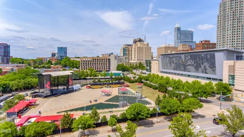 a view of swimming pool with seating space