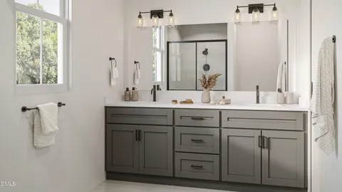 a bedroom with a bed chair and window